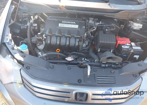 2010 Honda Insight Ex z USA, uszkodzony, nr VIN JHMZE2H7XAS012585